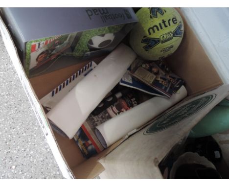 A box of football related items including vintage programmes