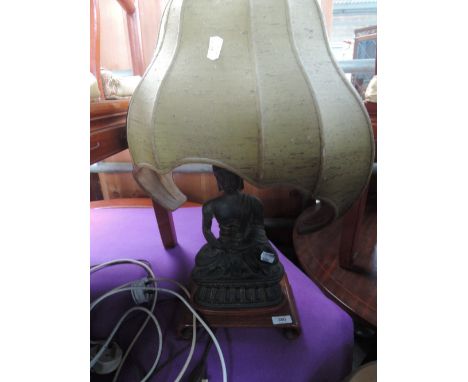 A table lamp modelled as deity