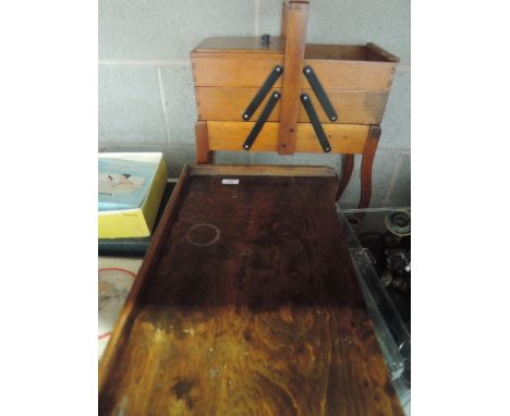 A vintage folding lap tray and sewing box