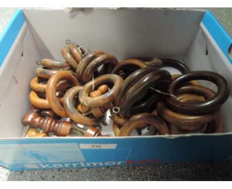 A box of vintage curtain rings 