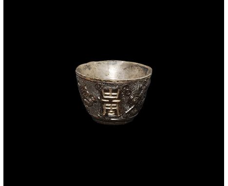 19th century AD. A miniature silver bowl with stamp to the inner face, encased in a lacquer shell with three vertical text ba