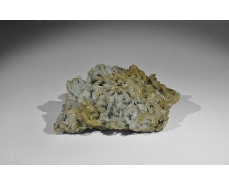 A large specimen of bladed blue-gray barite (or baryte), a barium sulphate, from the Gregory, Bottley, and Lloyd collection. 