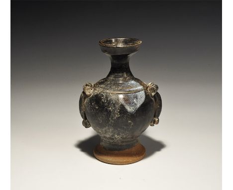An undated archaistic globular ceramic vase with flared base, waisted neck, two applied strap handles to the sides. 348 grams