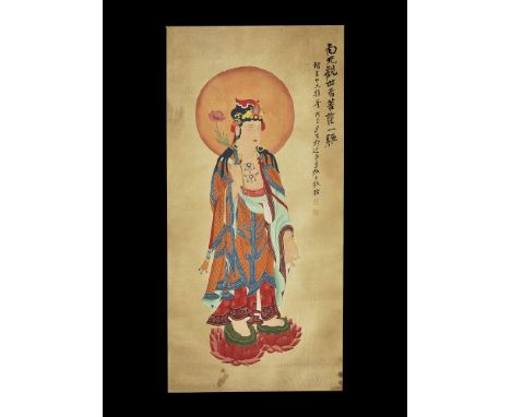 20th century AD. A rectangular paper panel on a fabric backing with wooden roller; painting of a robed Kwan Yin standing on t