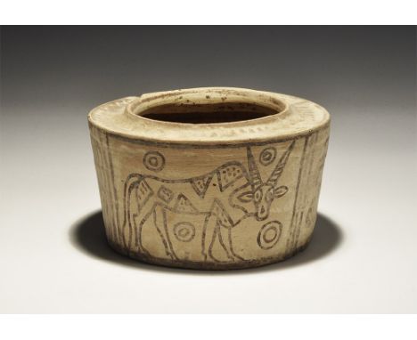 3300-1300 BC. A greyware ceramic jar with steep shoulder and dished upper face, band of painted chevrons to the shoulder, pan