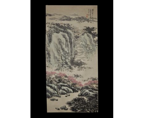 20th century AD. A rectangular paper panel on a fabric backing with wooden roller; painting of a landscape with buildings, ri
