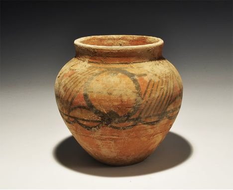 An undated archaistic squat terracotta jar with raised rim, band of painted polychrome geometric ornament to the shoulder. 64