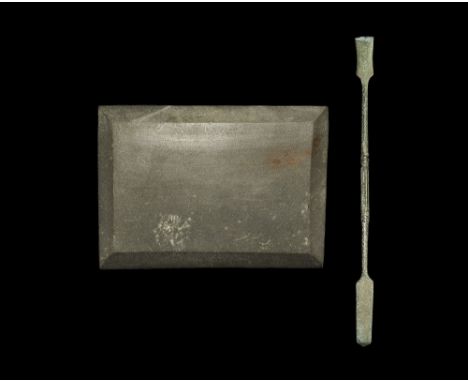 An undated archaistic mixed group of medical items comprising: a cast double-ended spatula with balustered shank; a rectangul