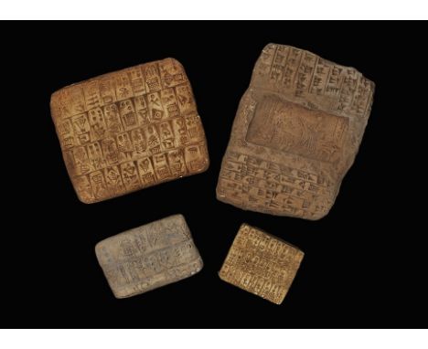 20th century AD. A mixed group of ceramic tablets comprising: one flat-section with impressed image to each broad face of a r