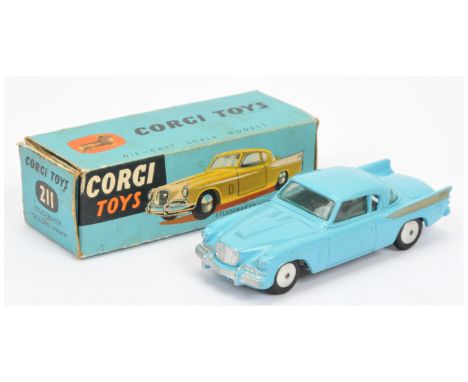 Corgi 211 Studebaker "Golden Hawk" - blue body, gold flashes, flat spun hubs - Near Mint in Fair tape repaired box.
