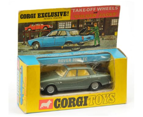 Corgi 275 Rover 2000 TC - sage green body, RARE IVORY INTERIOR, spare wheel carrier damaged - Near Mint in Good creased windo