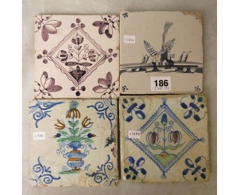 Group of four 17th and 18th century Dutch wall tiles comprising a Postzegel stamp tile of Fritellerie design with ox head cor