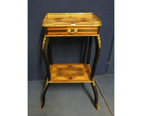 A 19th century French étagère having a gallery and marquetry inlaid top over a lower shelf and splayed legs