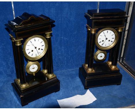 A 19th Century French ebonised and ormolu mounted portico mantel clock, the white enamel dial within an ormolu bezel, support