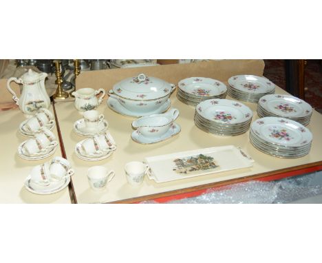 A modern French part dinner service, floral decorated and a French part tea service, with floral border and country scenes