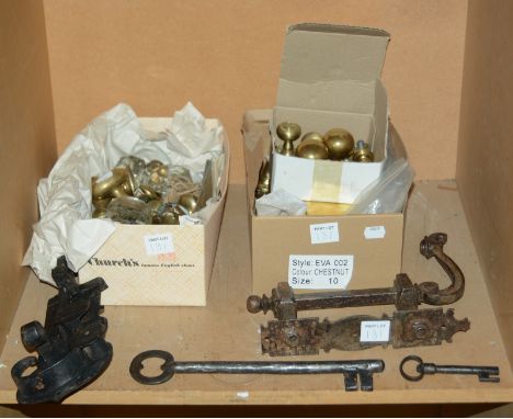 A quantity of 20th Century brass door handles, glass door handles, finger plates and a set of kitchen scales