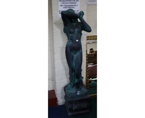 A painted ceramic frame of a scantily clad woman (simulating lead) 148cm high