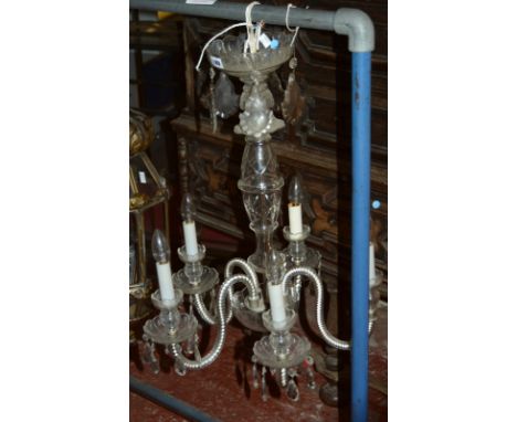 A 20th Century glass five light chandelier, 69cm long.