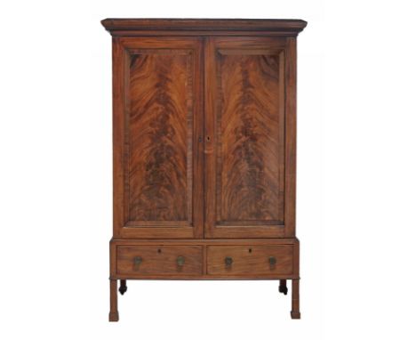 A late George III flame mahogany cupboard, circa 1800 and later, the caddy topped dentil cornice above two panel doors enclos