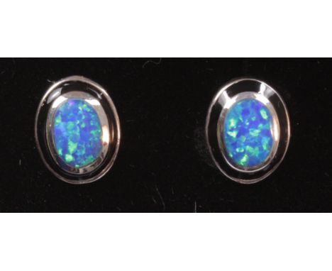 Pair blue opal stud ear-rings stamped 925   Condition Report   Click here for further images, condition, auction times & deli