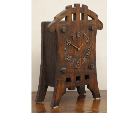 Arts & Crafts mantle clock by Sessions, oak case with applied numerals 8 day movement striking the hours on a gong and the ha