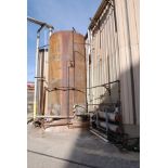Steel tank with affiliated piping and motor