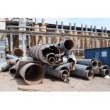 Scrap materials on ground including; poles, conduit and duct
