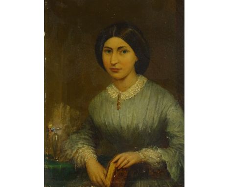 A 19th century oil on board, portrait of a woman holding a book, unsigned, 10" x 8", and a naive oil on wood panel, portrait 