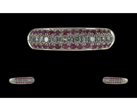 Channel Set 18ct White Gold - Pleasing Quality Diamond and Ruby Set Dress Ring. Full Hallmark to Interior of Shank. London 19