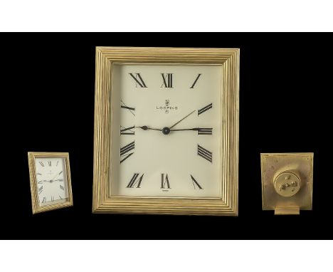 Looping Vintage Brass Alarm/Desk Clock, 8 day Swiss movement and in working order.  Measures 6" x 5".