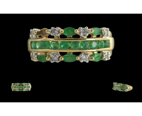 Ladies Attractive 9ct Gold Emerald and Diamond Set Dress Ring. Full Hallmark to Interior of Shank. The Emeralds and Diamond o