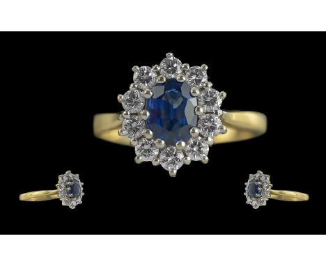 Ladies Pleasing Quality 18ct Gold Sapphire and Diamond Set Ring. Full Hallmark to Interior of Shank, The Sapphire of Good Col