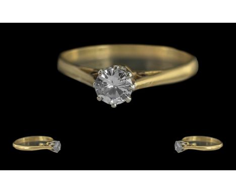 Ladies 18ct Gold Single Stone Diamond Set Ring. Marked 18ct to Interior of Shank. The Round Brilliant Cut Diamonds of Good Co