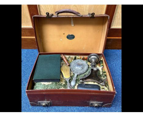 Suitcase containing tapestry, silver plated items, mirror, brush and centrepiece, and 1945 chart.  Together with photographs 