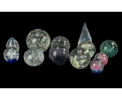 Collection of Paperweights, including a Caithness, 12 in total, assorted colours and designs.