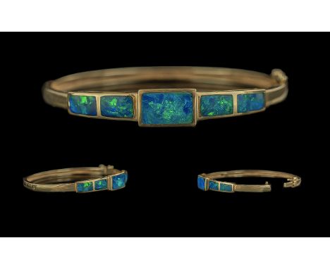 Ladies Excellent Quality 14ct Gold Opal Set Hinged Bangle - The Opals of Rectangular Form and Excellent Condition. Marked 585
