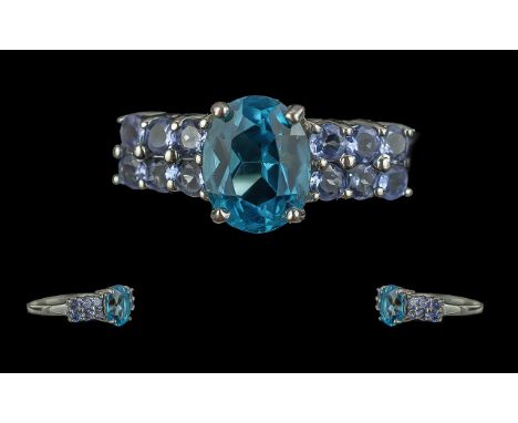 Ladies 9ct White Gold London Blue Topaz and Tanzanite Set Ring, full hallmark to interior of shank, the London blue topaz of 