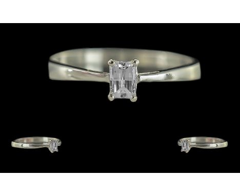 Ladies 18ct White Gold Single Stone Diamond Set Ring. Full Hallmark to Interior of Shank. The Step-cut Diamond of Top Colour 