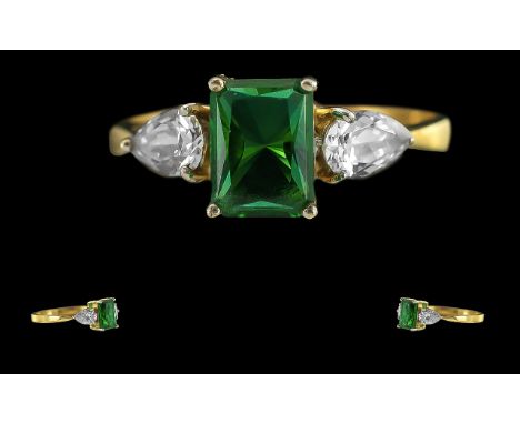 9ct Gold Dress Ring, central oblong green stone with teardrop shaped crystal to either side.  Ring size T.