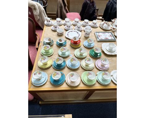 Large Collection of Bone China, including 15 x trios of colourful bone china with rose painted interiors, together with three