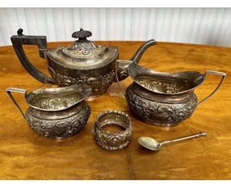 Silver Bachelor Tea Set, comprising an engraved teapot, milk jug and sugar bowl.  Together with a napkin ring and teaspoon.