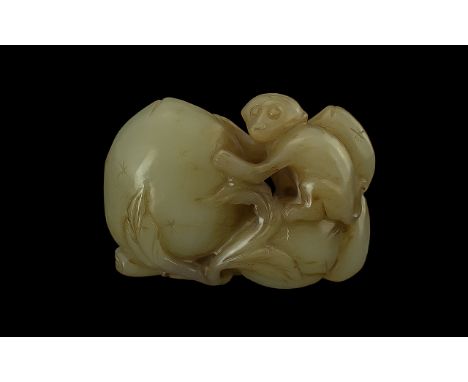 Chinese 19th Century Carved Jade Sculpture of a Small Monkey Next to a Large Egg Like Object. Weight 126.2 grams. Length 2.5 