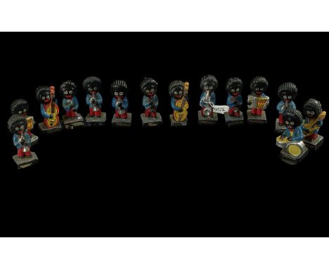 Collection of Robertson Band Figures, all playing musical instruments, 14 in total. Measure 3" high. Notice from the the-sale