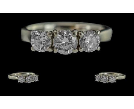 Ladies 18ct White Gold Superior Three Stone Diamond Set Ring, full hallmark to shank, the well matched trio of round brillian