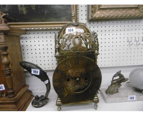 AN EARLY BRASS LANTERN CLOCK FITTED WITH LATER 19TH CENTURY FUSEE MOVEMENT, DIAL SIGNED DeWelke 1625 (15" HIGH)