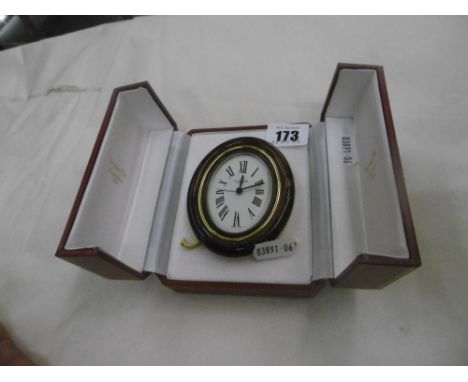 A BOXED CARTIER ALARM CLOCK WITH PAPERWORK