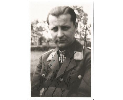 Hubert Rauch WW2 Luftwaffe ace signed 6 x 4 b/w portrait photo. Good Condition. All signed items come with our certificate of