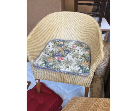 A WOVEN COMMODE CHAIR