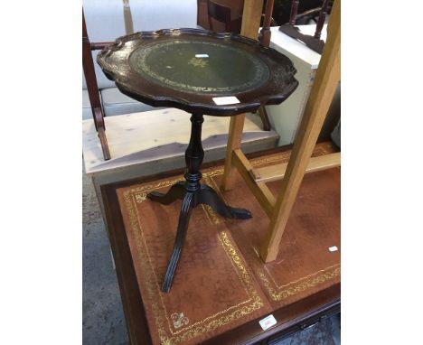 A REPRODUCTION TRIPOD TABLE