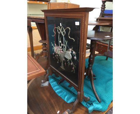 AN EDWARDIAN INLAID FIRE SCREEN WITH NEEDLEWORK PANEL